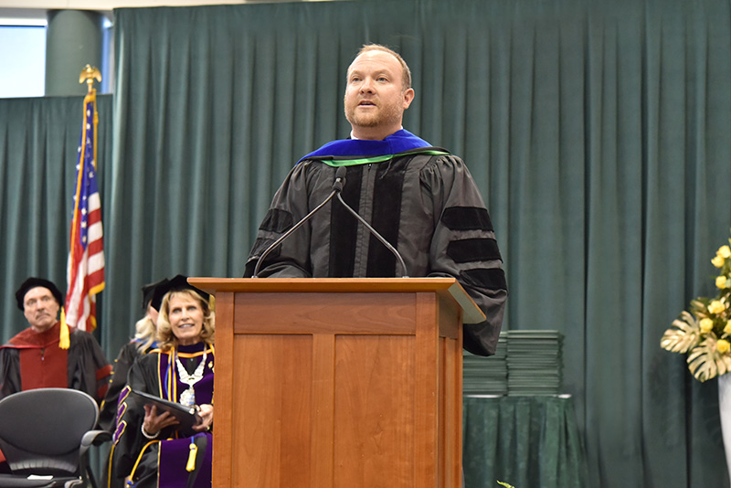 Honorary degree recipient and commencement speaker Jeff Ragovin, a 2000 Oswego alumnus and the chief growth officer of Social Native, addresses candidates for graduation