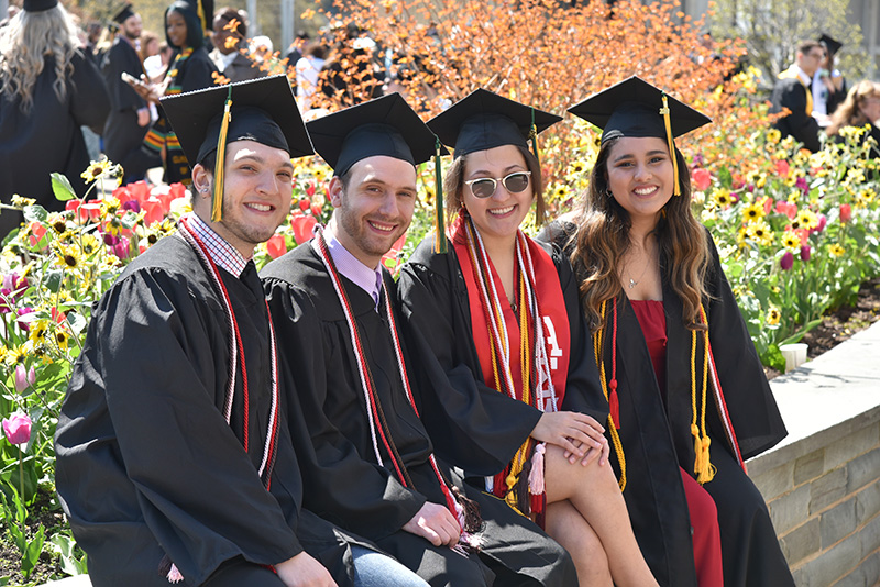 Communication studies students gather in advance of their Commencement