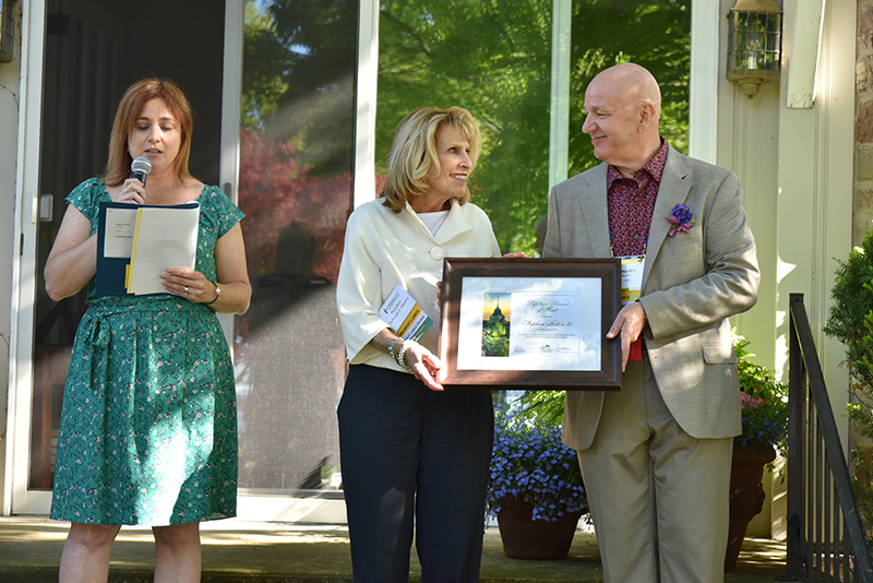 Stephen Butler, executive director of CNY ART receives an alumni Lifetime Award of Merit