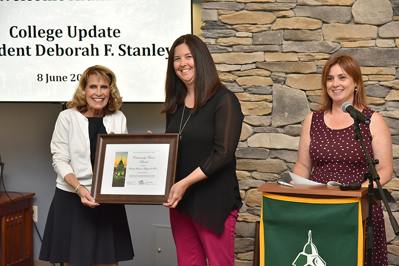 Alumna Christy Harrison Huynh, associate director of career services at SUNY Oswego, receives the Community Service Award