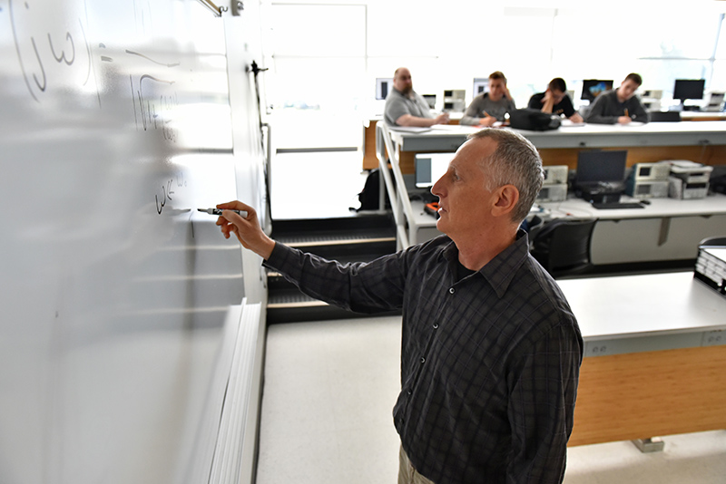 Adrian Ieta of the electrical and computer engineering faculty teaches a Microelectronic Circuits class