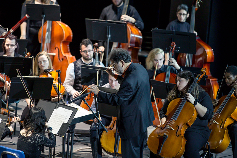 Music professor Juan LaManna directs the College-Community Orchestra