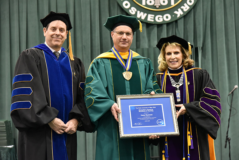 Casey Raymond, associate professor of chemistry at SUNY Oswego and acting director of the college’s Honors Program, receives a 2019 SUNY Chancellor’s Award for Excellence in Teaching