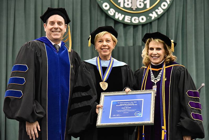 Dr. Irene Scruton (center), assistant dean and director of MBA programs in the School of Business, for receives a 2019 SUNY Chancellor’s Award for Excellence in Professional Service.