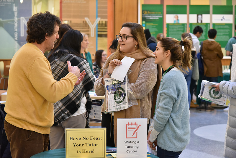 Oswego staff and faculty help welcome students during international student orientation