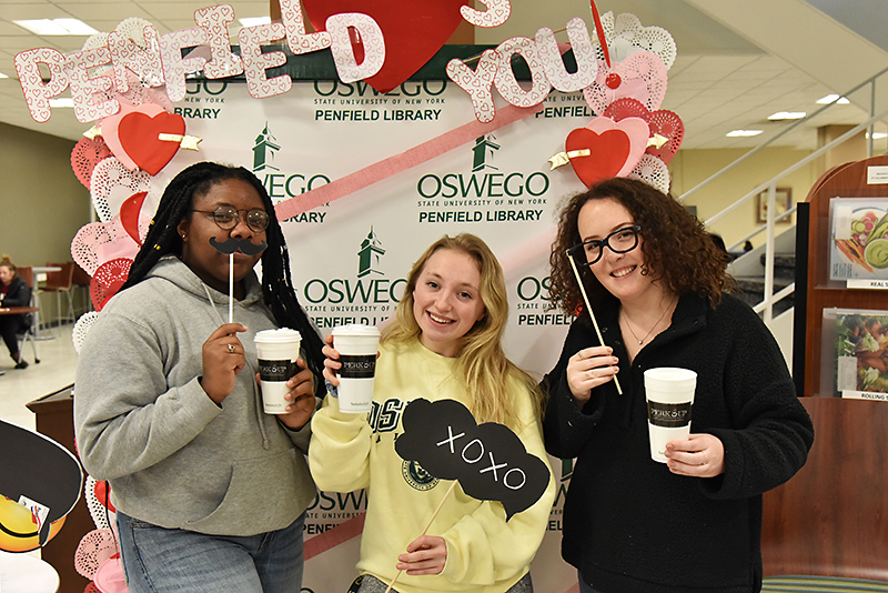 Students enjoy Penfield Library Loves You Day