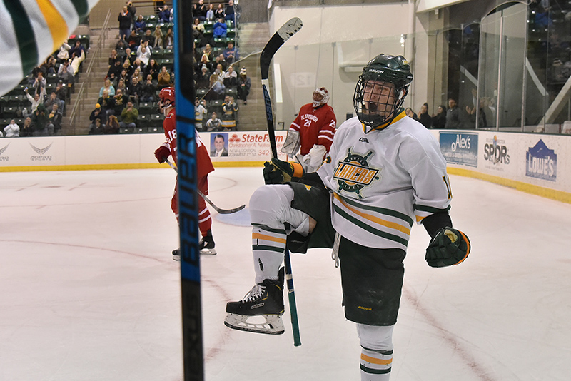 Laker men's hockey senior forward Josh Zizek (#13) celebrates his goal