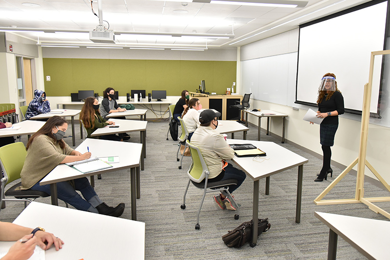 Jodi Mullen of the counseling and psychological services faculty leads a class in a renovated section of Wilber Hall.