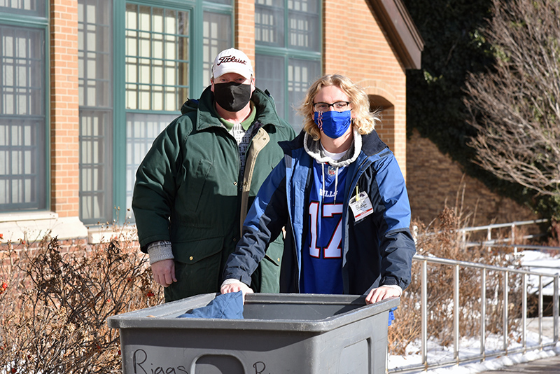 Ray Paull, a sophomore and ardent Buffalo Bills fan, moves into Riggs Hall with help from his dad on Jan. 24.