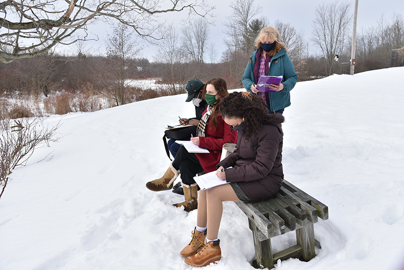 The Nature Writing workshop, led by Rice Creek Field Station naturalist Linda Knowles (standing), featured student writers Heaven Santiago (foreground), Rachel Blake and Ryan Ravenell enjoying some of their "natural" creativity during Wellness Day on Feb. 24.