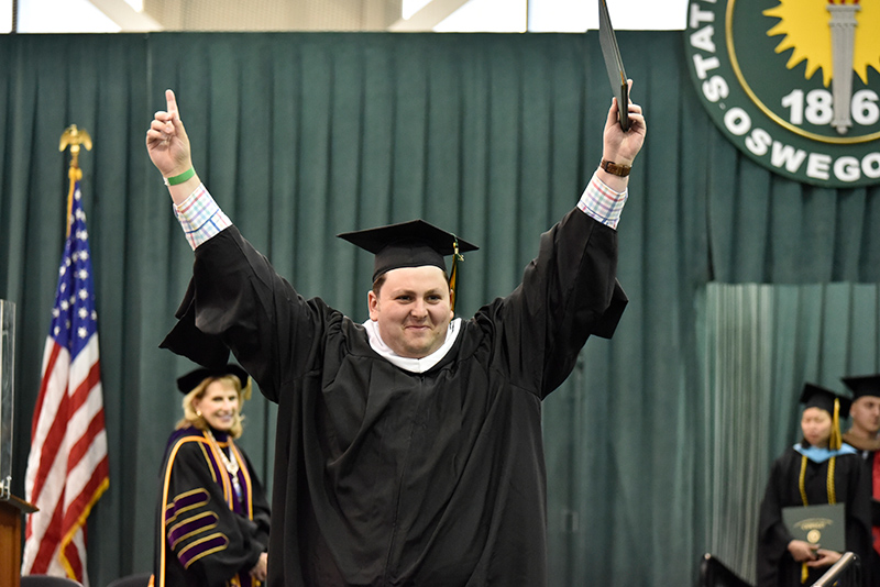 Joseph Panzarino shows his excitement during the May 14 Commencement ceremony.