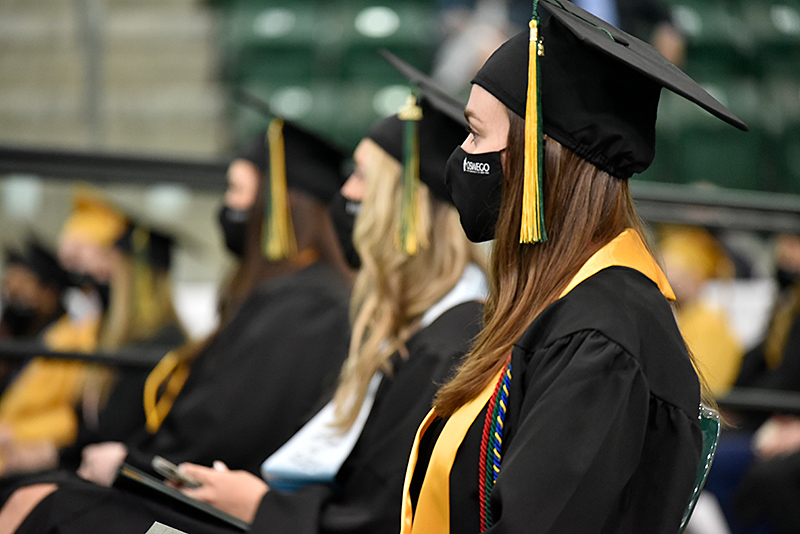Graduates listen to Commencement platform remarks during the 3 p.m. ceremony on  May 15 in the Marano Campus Center.