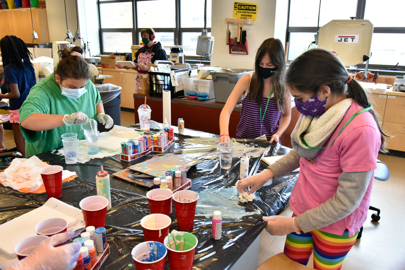 The 42nd annual Sheldon Institute for Barbara Shineman Scholars, designed to address the academic and cultural needs of motivated, inquisitive and creative young students, ran July 19 through 30 on campus. Pictured are students in grades 6-7 and 8-10 expressing their artistic talents during an abstract art painting class taught by Lauren Siskavich.