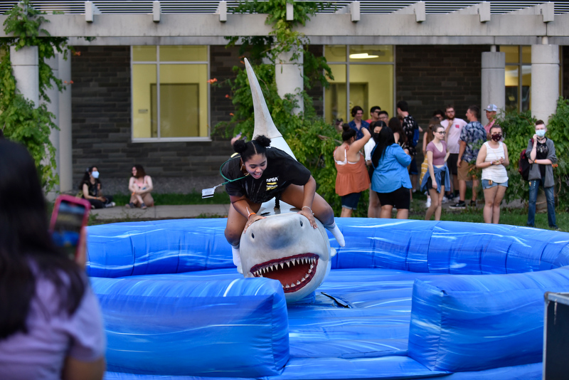 The ever-popular Great White Shark mechanical rodeo ride was challenged by many at the Laker Launch Pre-Torchlight Party.