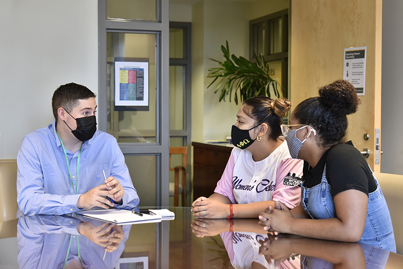 The Advisement Center, which was previously in Hewitt, has a new home in 151 Marano Campus Center (near The Compass) to help students transition academically from high school by providing academic advising, connections to campus resources and academic success workshops. Shown from left are Advisement Guides Eli Holicky, Yadi Aranda Burgos and Dayzja Tyler.