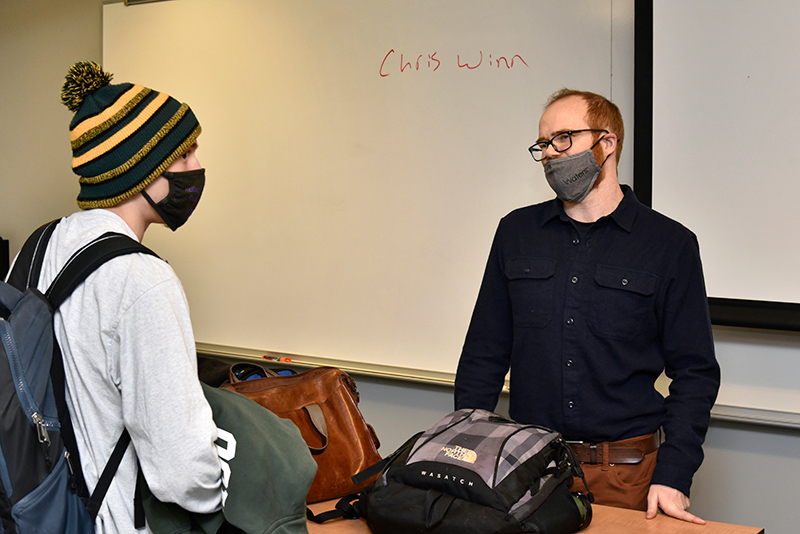 2015 chemistry alumnus Chris Winn, an account manager with Waters Corporation and has also worked for SGS Galson and Anheuser Busch, talked about the career with several chemistry classes on Nov. 15. He is pictured speaking with student Tyler Ziobro, a chemistry major, after Fehmi Damkaci's Organic Chemistry class. 