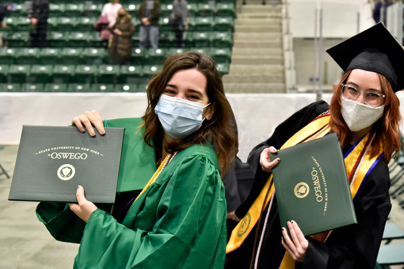 Graduates of the class of 2020 show their pride during their commencement ceremony Dec. 11 in the Deborah F. Stanley Arena & Convocation Center.