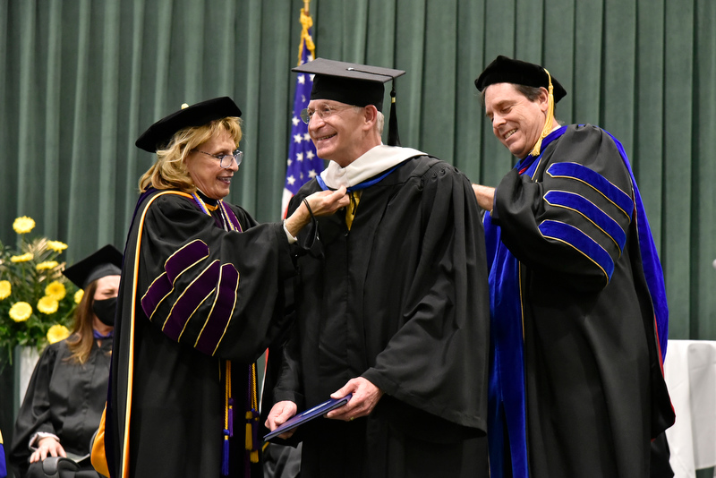 Mark Baum – a 1981 graduate and chief collaboration and commercial officer for the Food Marketing Institute who serves as a director on the Oswego College Foundation, Inc. and chairs its Development Committee – received a SUNY Honorary Doctor of Humane Letters for his service to the institution, the business world and society in general