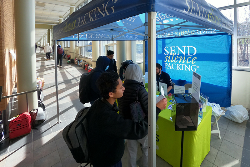 SUNY Oswego's Counseling Services Center partnered with Active Minds to bring their "Send Silence Packing" exhibit to campus April 11. Active Minds (activeminds.org) is the nation’s leading nonprofit working to change the culture around mental health. Send Silence Packing is a display that inspires action around suicide by sending the message that viewers are not alone, help is available and everybody plays a critical role in changing the culture around mental health.