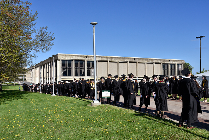 Graduates in the College of Liberal Arts and Sciences line up outside Marano Campus Center before their 9 a.m. Commencement ceremony in the Deborah F. Stanley Arena and Convocation Hall.