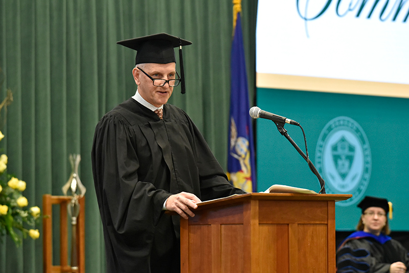 Joseph Lauko, executive vice president and chief operating officer for SRC Inc. and chairperson of SRC International Inc., addresses the graduates at the 9 a.m. ceremony for the College of Liberal Arts and Sciences.