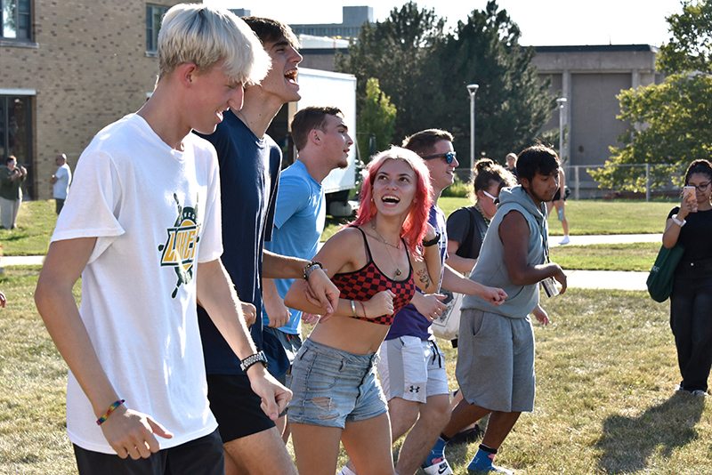 Students dance to music at the Opening Picnic at SUNY Oswego on August 19, 2022.