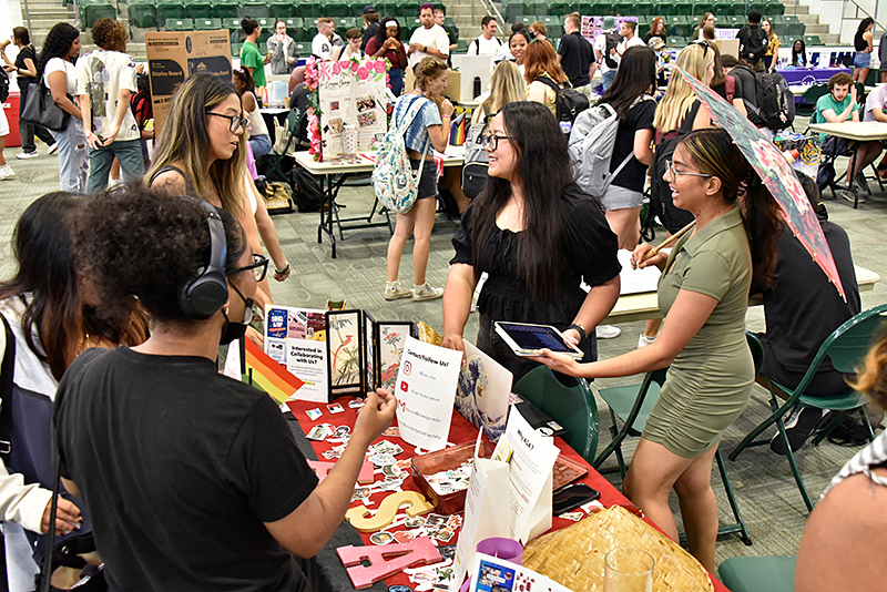 Students gathered at the Asian Student Association table at the Student Involvement Fair