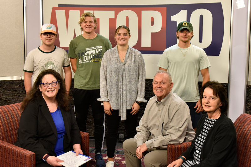 Alumni couple Peter '75 & Andrea Bocko '73 M '75 (seated center and right) visited campus to participate in an Oswego Alumni Association podcast interview at WTOP-TV Studio, joined by students from the campus TV station. Hosted by 1985 alumna Dee Perkins (seated at left), the monthly podcast interviews alumni from a diverse range of backgrounds to discuss their experiences at Oswego and life after graduation. 