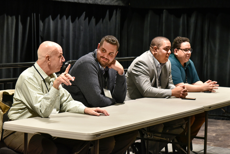 The School of Communication, Media and the Arts (SCMA) advisory board members, from left, Stephen Butler '85, Tom Murphy '14, Gabriel Almanzar '05 and Omy Melo '14, led a panel discussion Sept. 30 in Tyler Halls's lab theatre for SCMA students. 