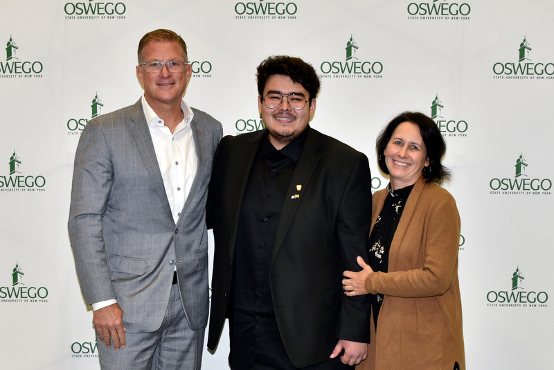 Jeff ’92 and Ginger Bray Sorensen ’93, pictured at the annual scholars brunch Oct. 1 with Aziz Sarimsakov ’24 – one of the many scholarship recipients – served as challengers for the successful "1861 Giving Challenge" during the second annual Founder’s Weekend celebration to raise scholarship funds for Oswego students. The challenge inspired 931 people to make a gift during 1,861 minutes on Sept. 28-29, exceeding the goal of 861 donors. 