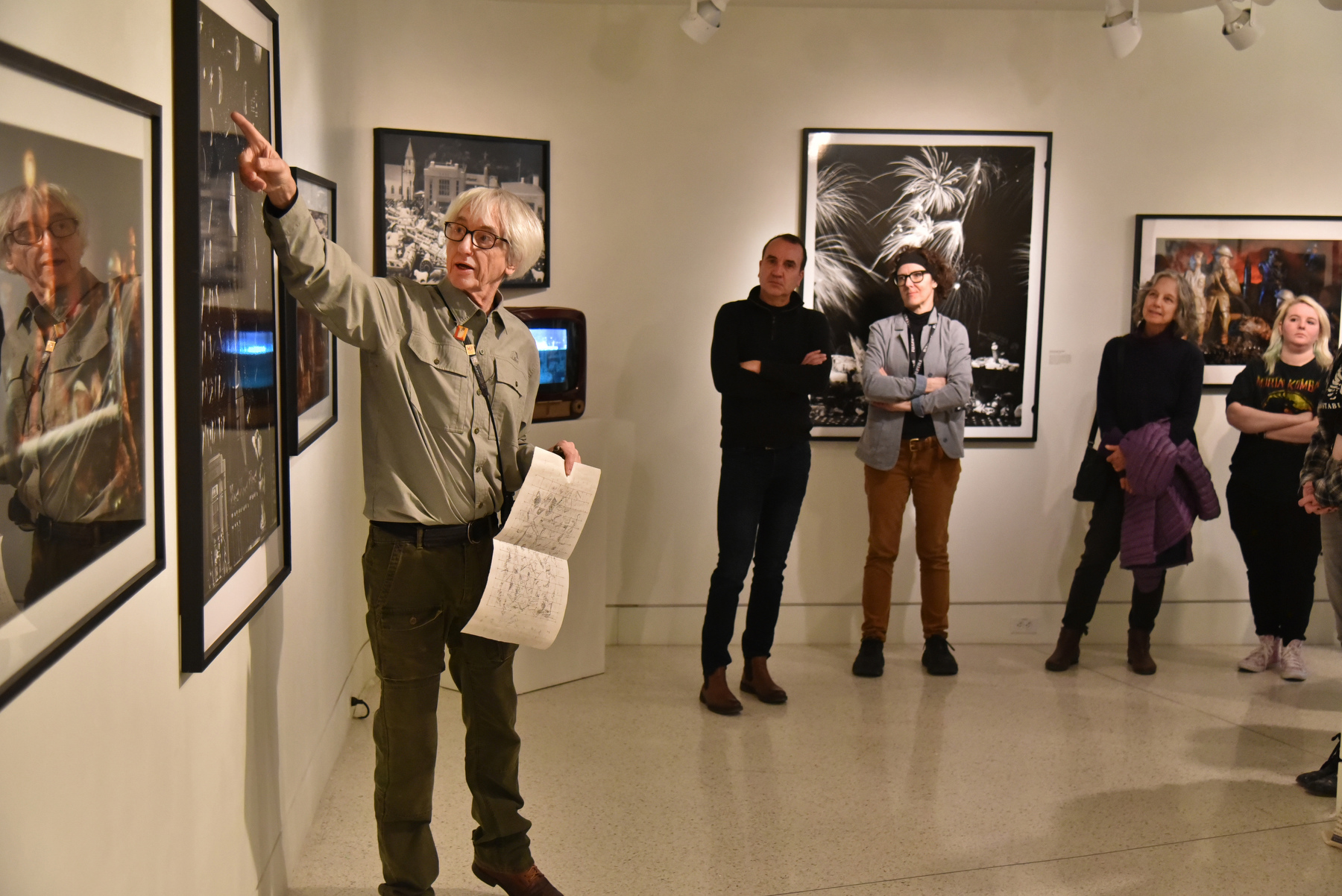 Syracuse area artist, photographer and educator Paul Pearce, who earned his master's degree from SUNY Oswego in 1982 and taught art and photography here from 2003 to 2013, led an artist's talk Feb. 15 about  "Fire for Effect" on exhibit in Tyler Art Gallery. 