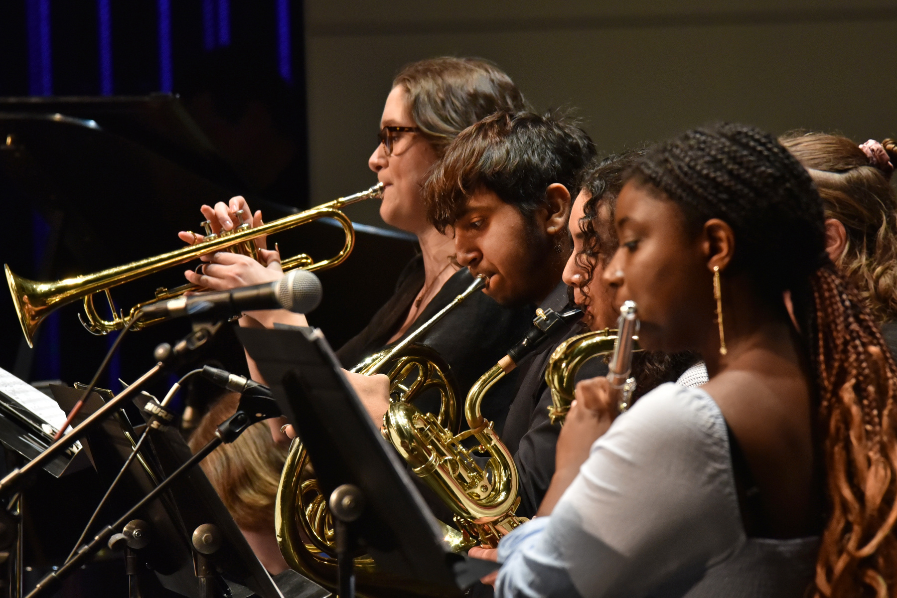 Pictured performing is a section of the Oswego State Latin Jazz Ensemble directed by music faculty member Eric Schmitz.