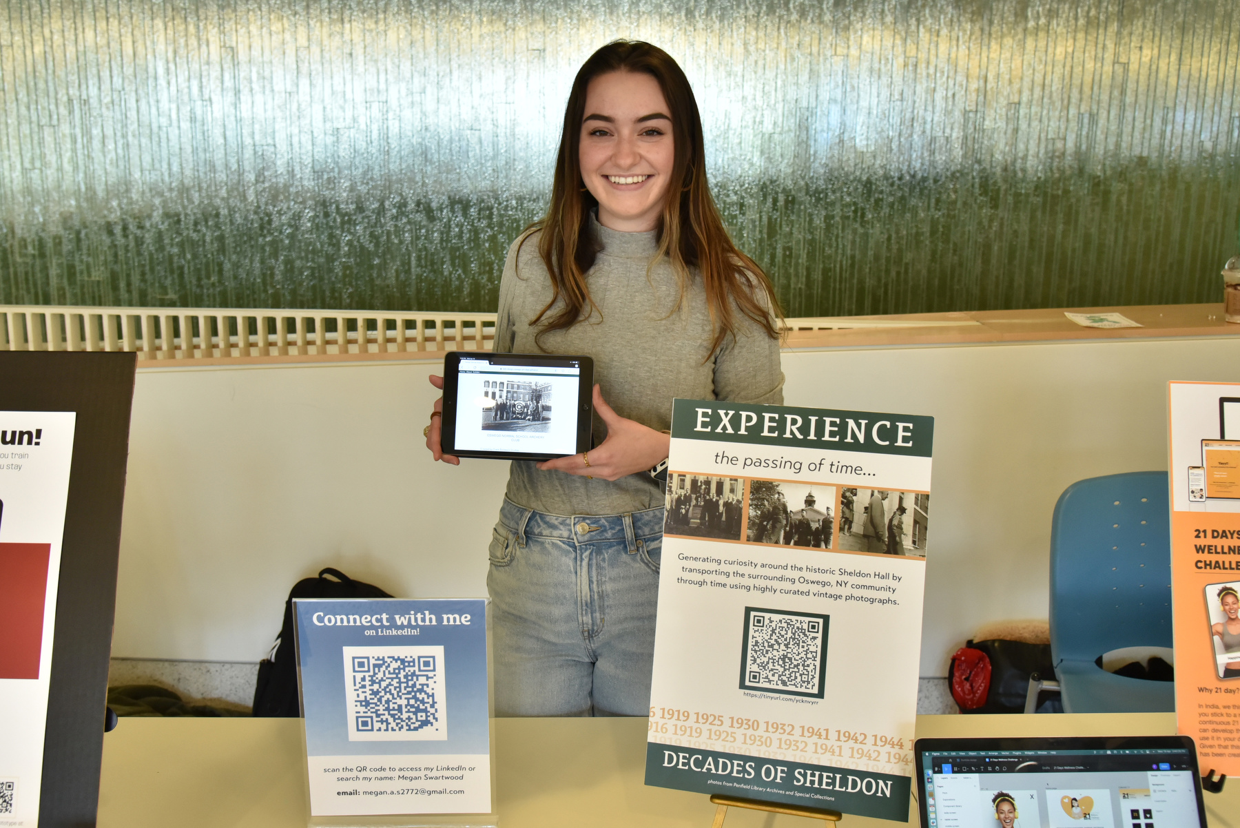 Art student Megan Swartwood created a tour of the college's history in "Decades of Sheldon," including milestone archival photos from Penfield Library's Special Collections, presented during Quest Day in Tyler Hall.