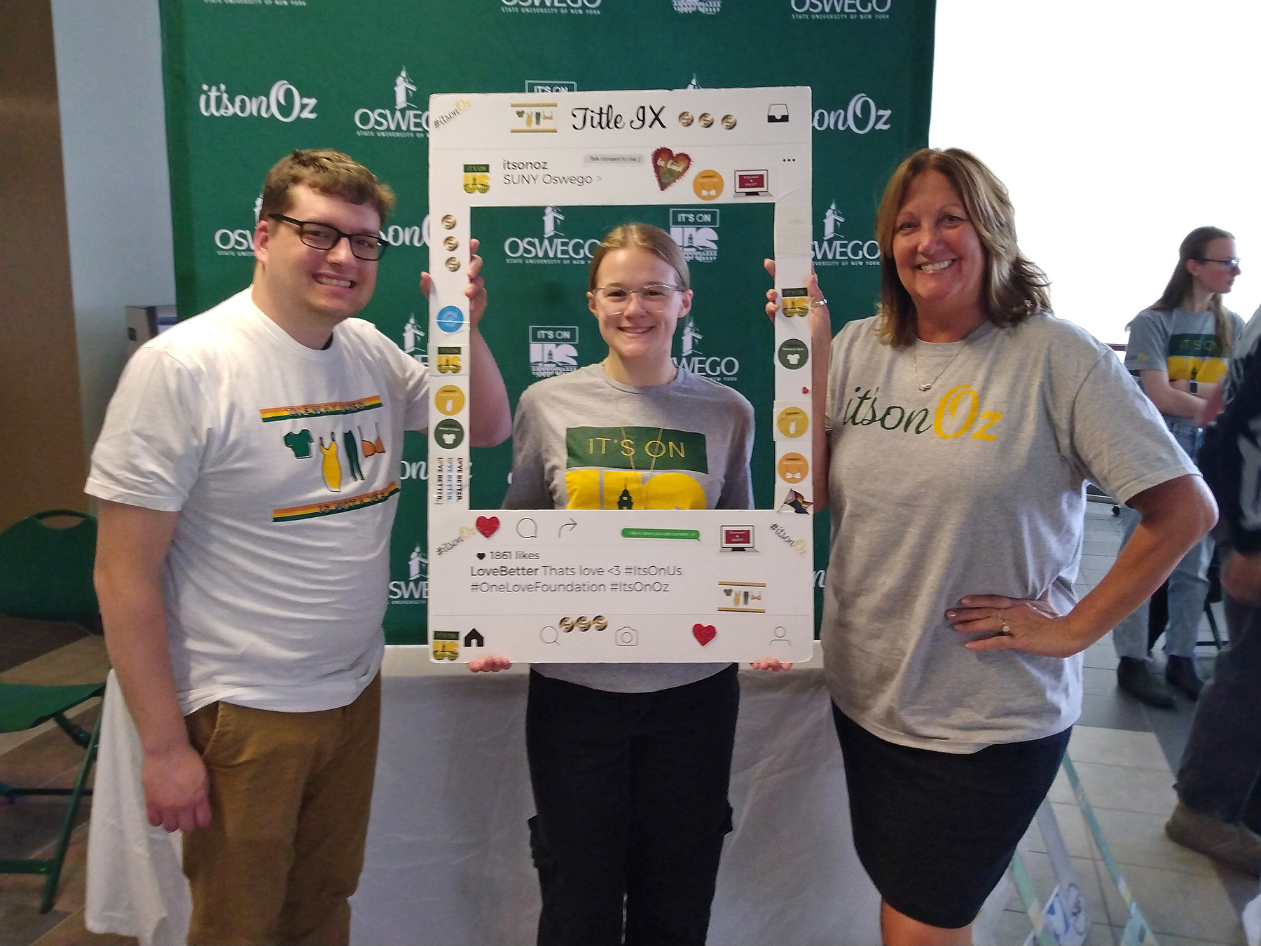 Pictured April 20 at their table in Marano Campus Center is, from left. Justin Dickerson, director of new student orientation and family engagement; Kayleigh Sherman, It's On Oz intern; and Lisa Evaneski, campus Title IX coordinator.