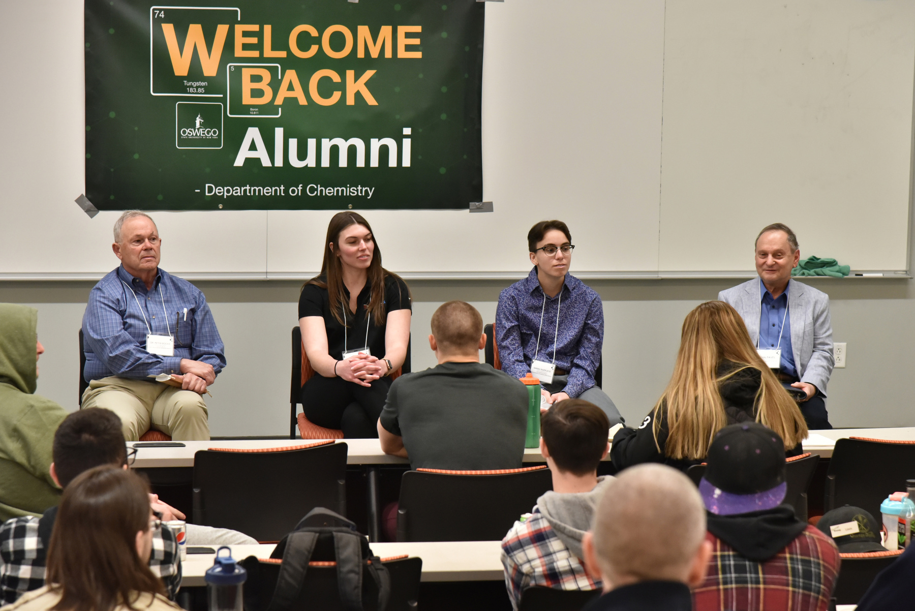 Chemistry alumni visited campus April 24 to talk with current students. From left is Peter Bocko '73, retired chief technology officer, Corning Incorporated; Morgan Wolanin '20, technical service engineer, MacDermid Alpha Electronics Solutions; Sarah Rappleye '20, lab technician, Eastman Kodak Company; and John Pavel '72 M'05, retired supervisor, Nine Mile Point Nuclear Station.