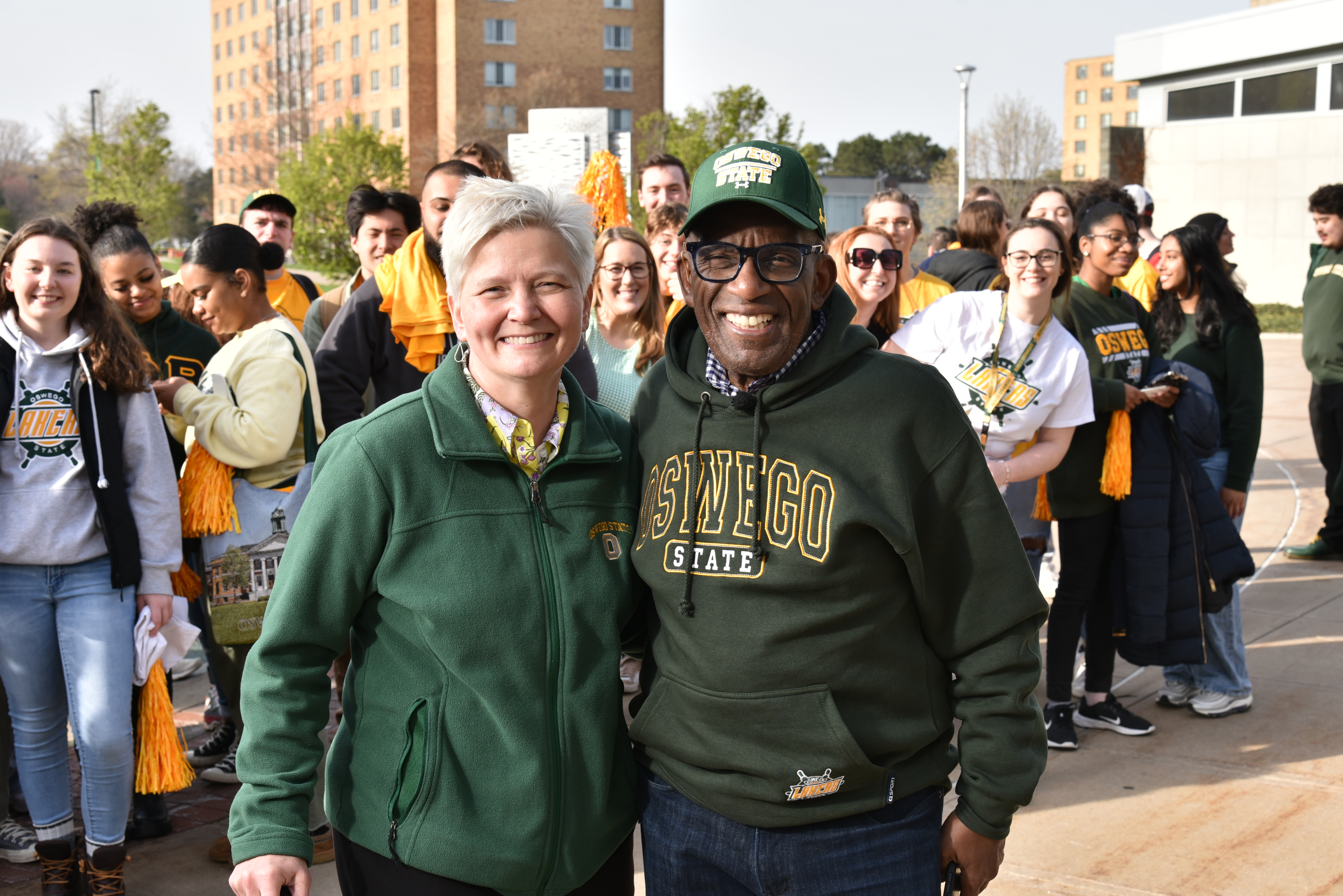 NBC Today show co-host and weatherman Al Roker '76 was on campus for an April 27 in-person visit to the “Building an On-Air Career” course he co-teaches with Michael Riecke in communication studies, then stayed for live hits on Today during the April 28 morning show. Here he joins SUNY Oswego Officer in Charge Mary C. Toale outside Marano Campus Center during the April 28 broadcasts. 