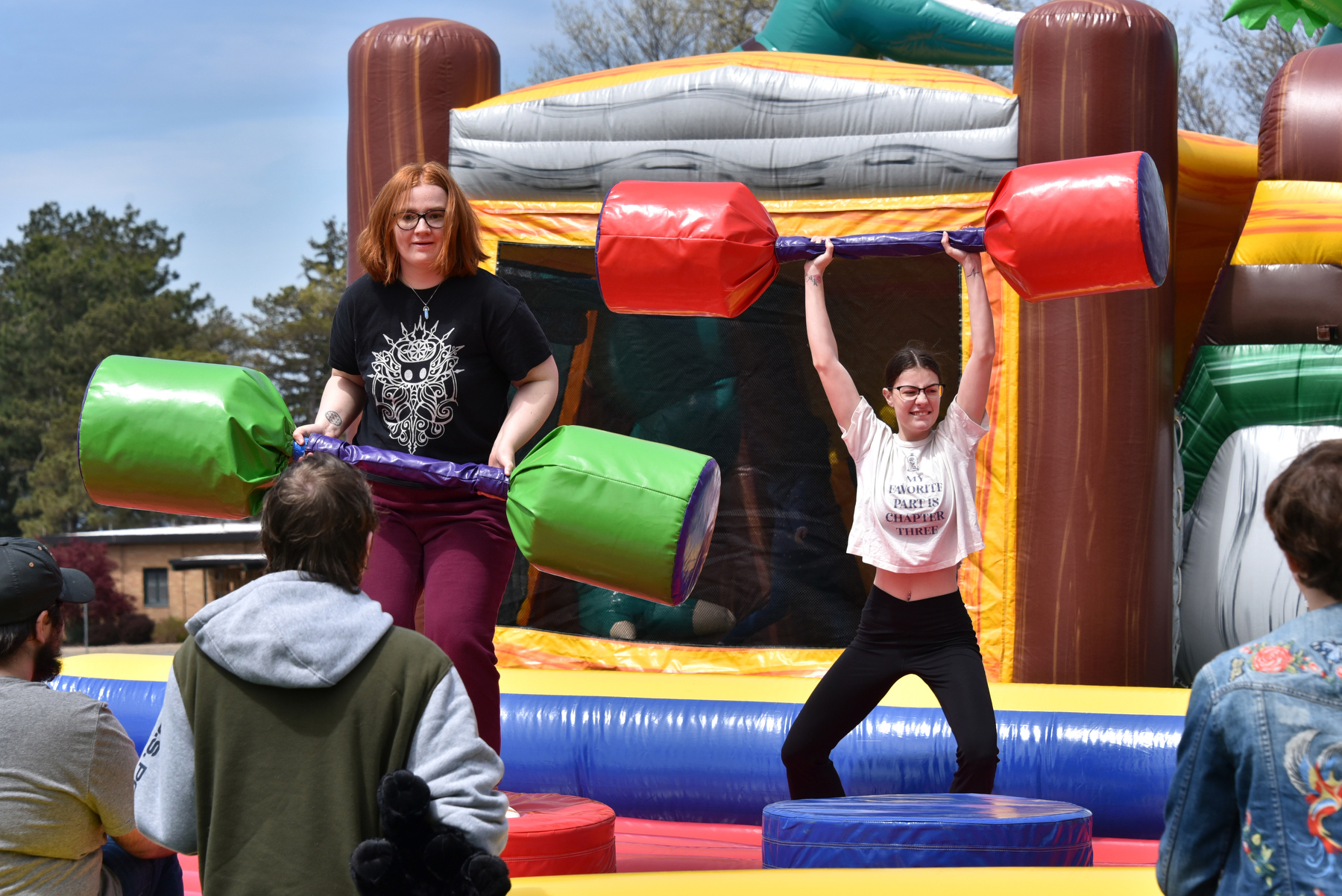 During the May 5 OzFest, Jenna Carpenter (left), a senior illustration major, and Alyssa Curling, a graduate mental health counseling major, show off their skills in a friendly pugilistic contest.