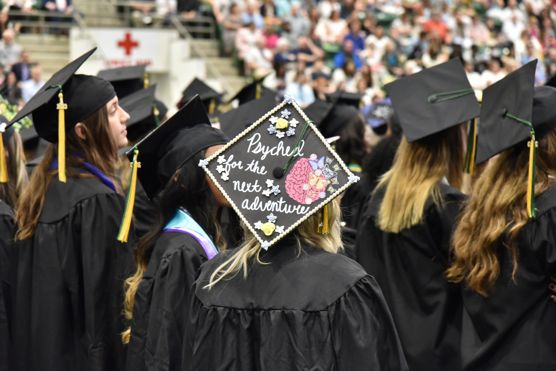 Graduates show enthusiasm in their achievements -- and toward their future adventures -- during the College of Liberal Arts and Sciences Commencement ceremony.
