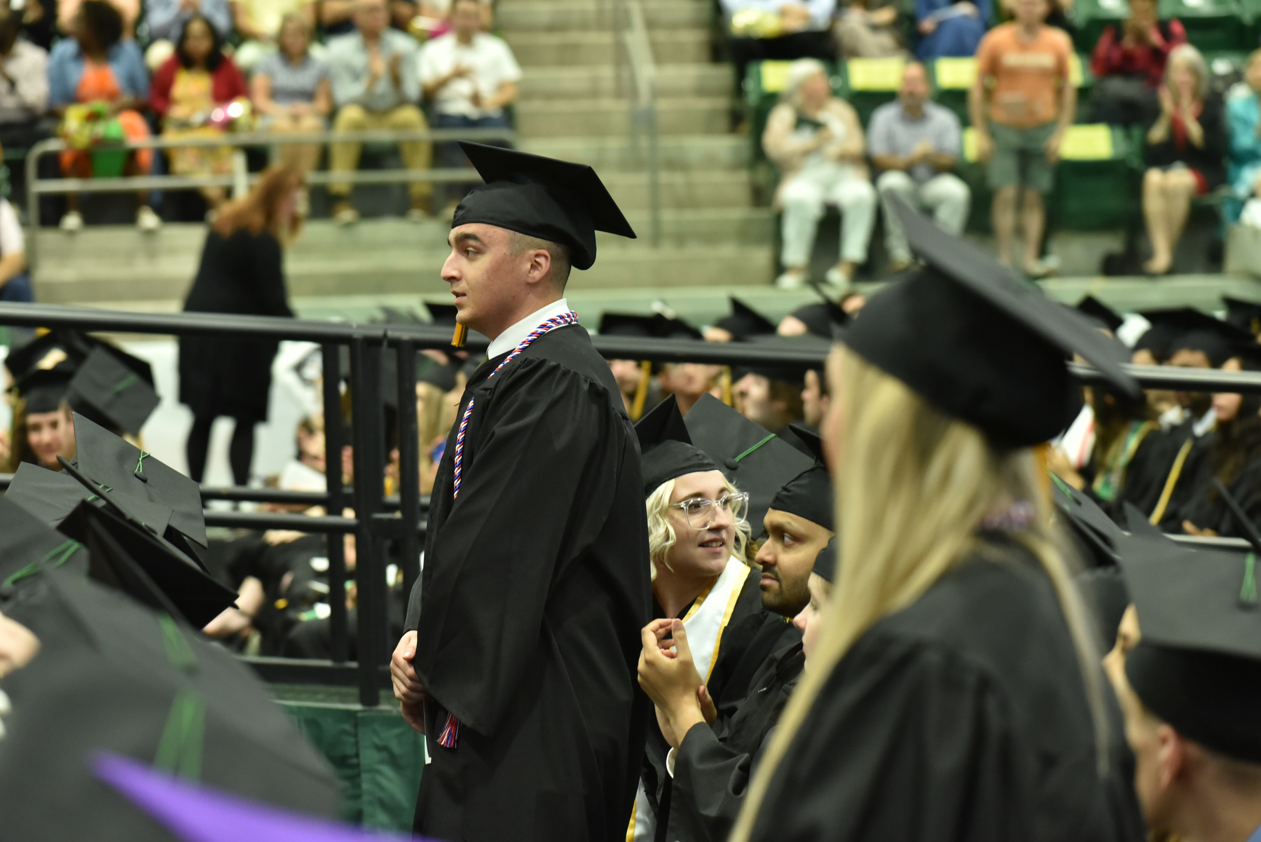 Graduating members of the U.S. military and veterans stood in recognition for their service during each of the three Commencement ceremonies.