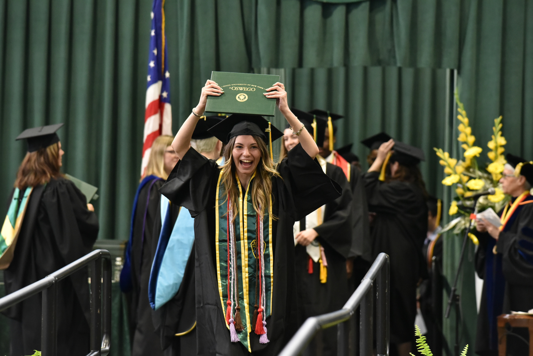 Graduates found time to celebrate during the ceremonies for the School of Communication, Media and the Arts and the School of Education.