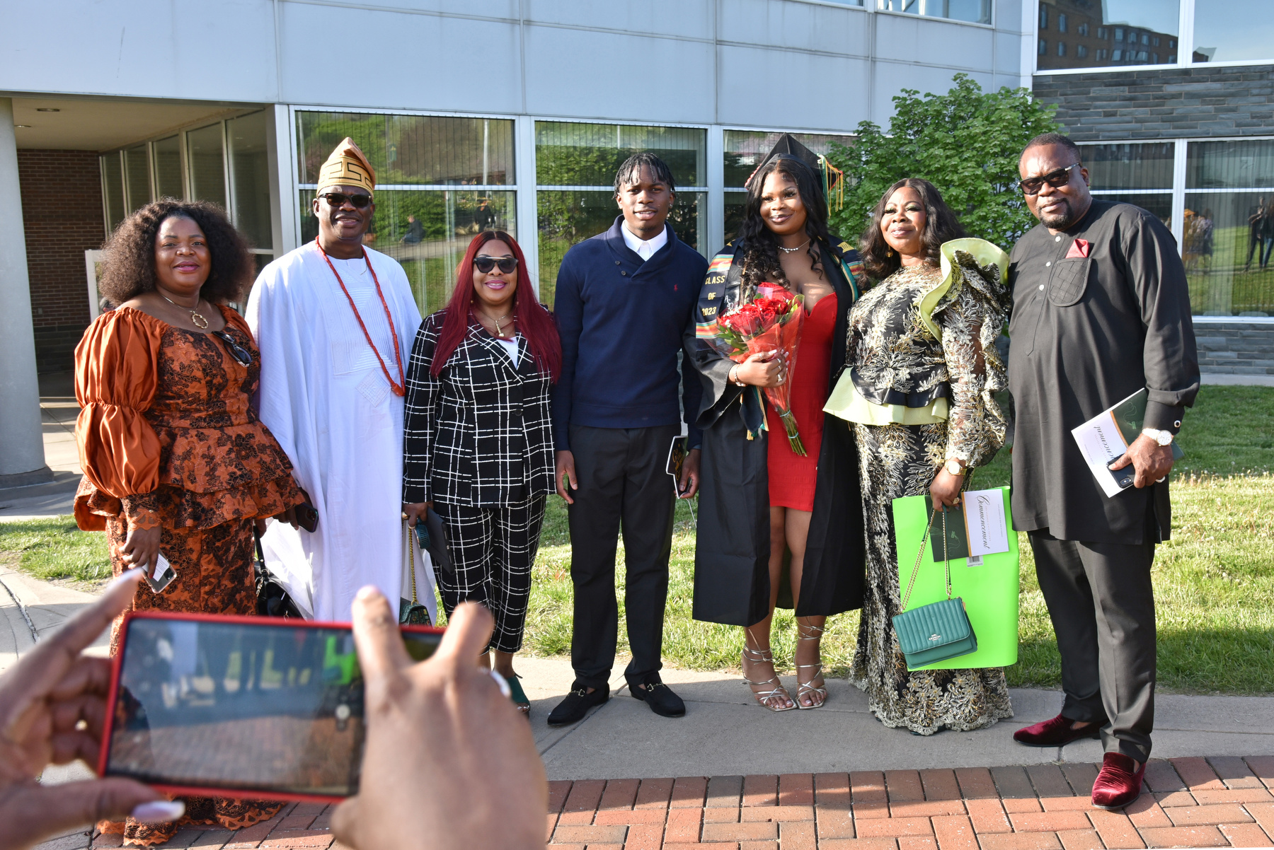 Graduates and guests gather after the 4 p.m. School of Communication, Media and the Arts and the School of Education commencement ceremony.