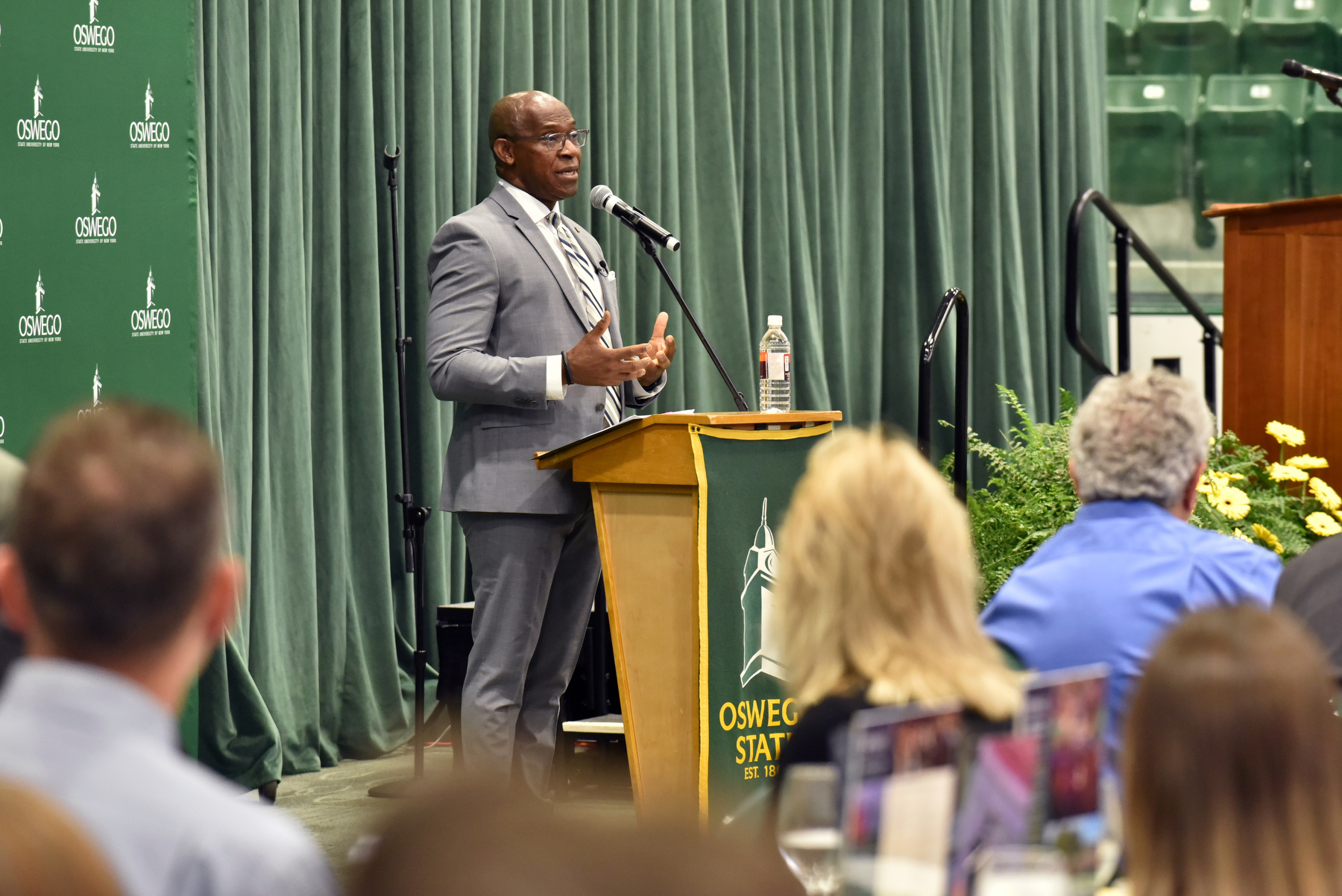 President Peter O. Nwosu welcomes faculty and staff during the annual Opening Breakfast at the beginning of the 2023-2024 academic year. The Aug. 22 breakfast was held in Deborah F. Stanley Arena and Convocation Hall, Marano Campus Center.