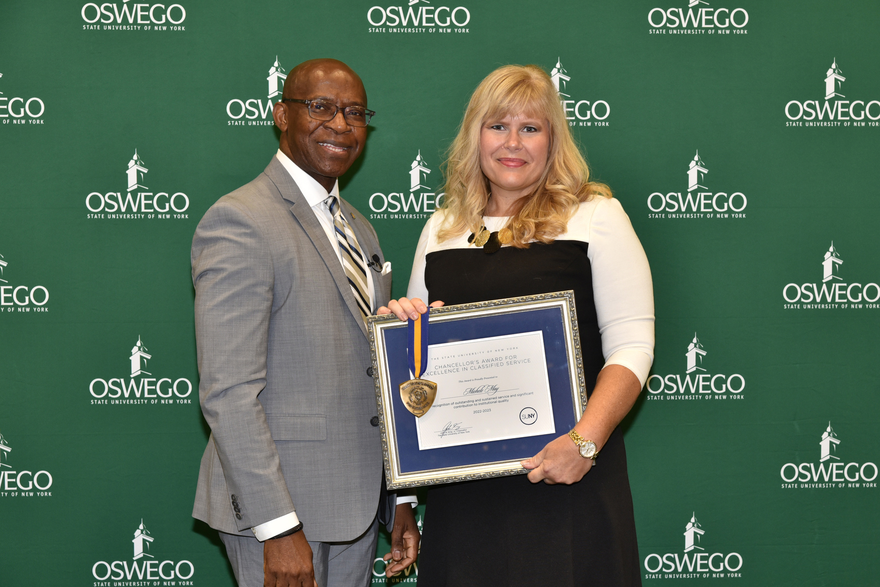 The SUNY Chancellor's Award for Excellence in Classified Service was officially presented to Michele May by President Peter O. Nwosu during the Opening Breakfast.