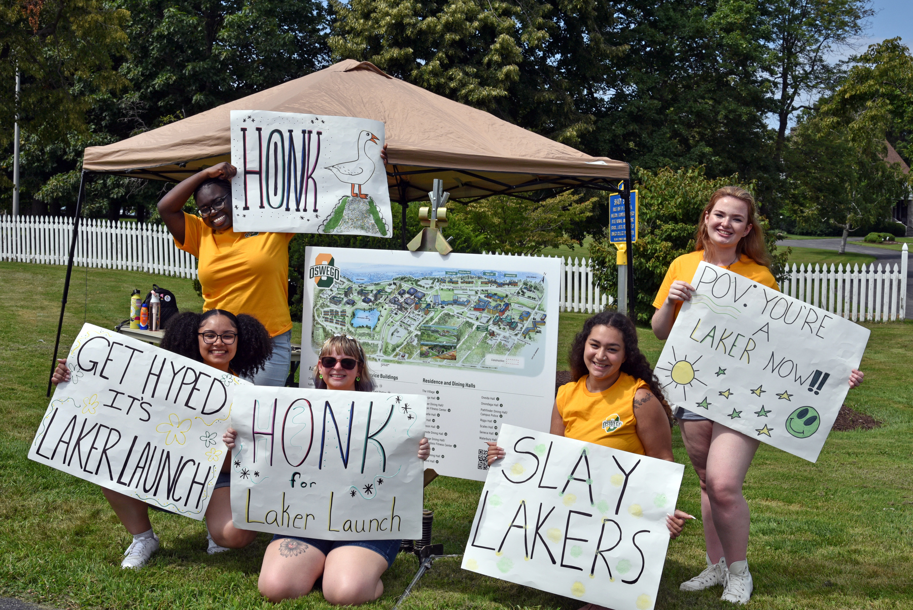 Teams of student volunteers were on hand to help with move-in week, directing incoming traffic to specific residence halls. One such group pictured at their station just outside Shady Shore greeted first-year stduents on their way to Johnson Hall and other lakeside halls.