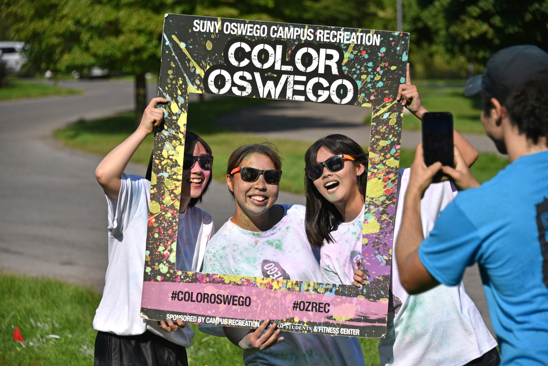 Students pose during the annual Color Run, co-sponsored by the Dean of Students Office/Oz Peer Eds program and the Fitness Center.