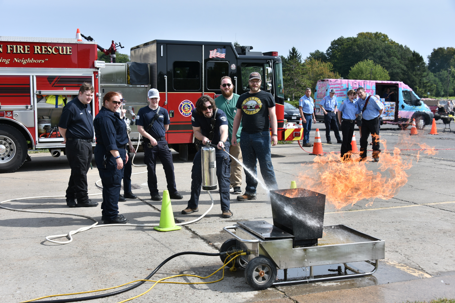 Fire extinguisher practice and hands-on demonstrations were part of Fire Safety Day on Sept. 23. Students had the opportunity to practice putting out live fires with portable fire extinguishers. The event hosted by Facilities Services, University Police and Oswego Town Fire Department was held in the Culkin Hall parking lot.