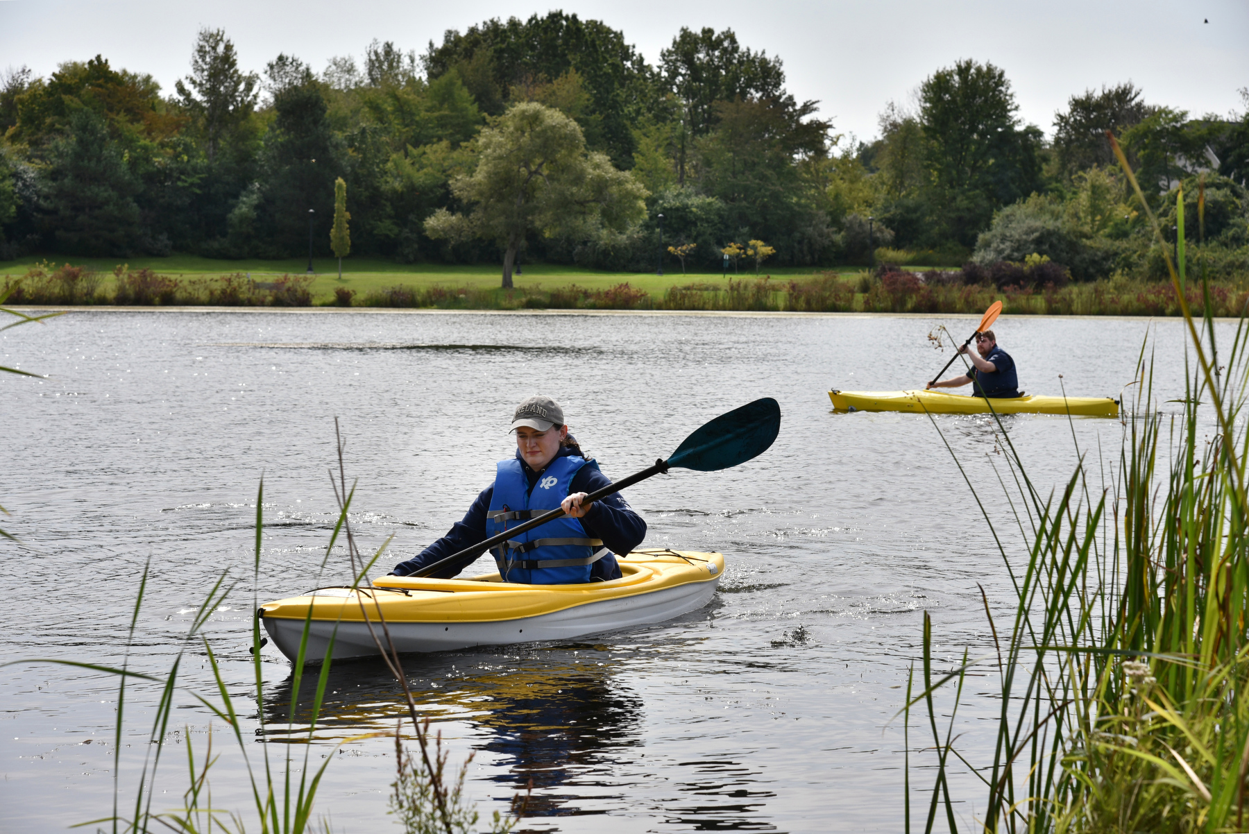 A kayaking and fishing day was held at Glimmerglass Lagoon on campus on Sept. 23 where students caught some fish and enjoyed a relaxing day on the water. Sustainability Office interns Kristen Hogan and Dan Griffin are pictured enjoying a beautiful fall day on the pond during the event.