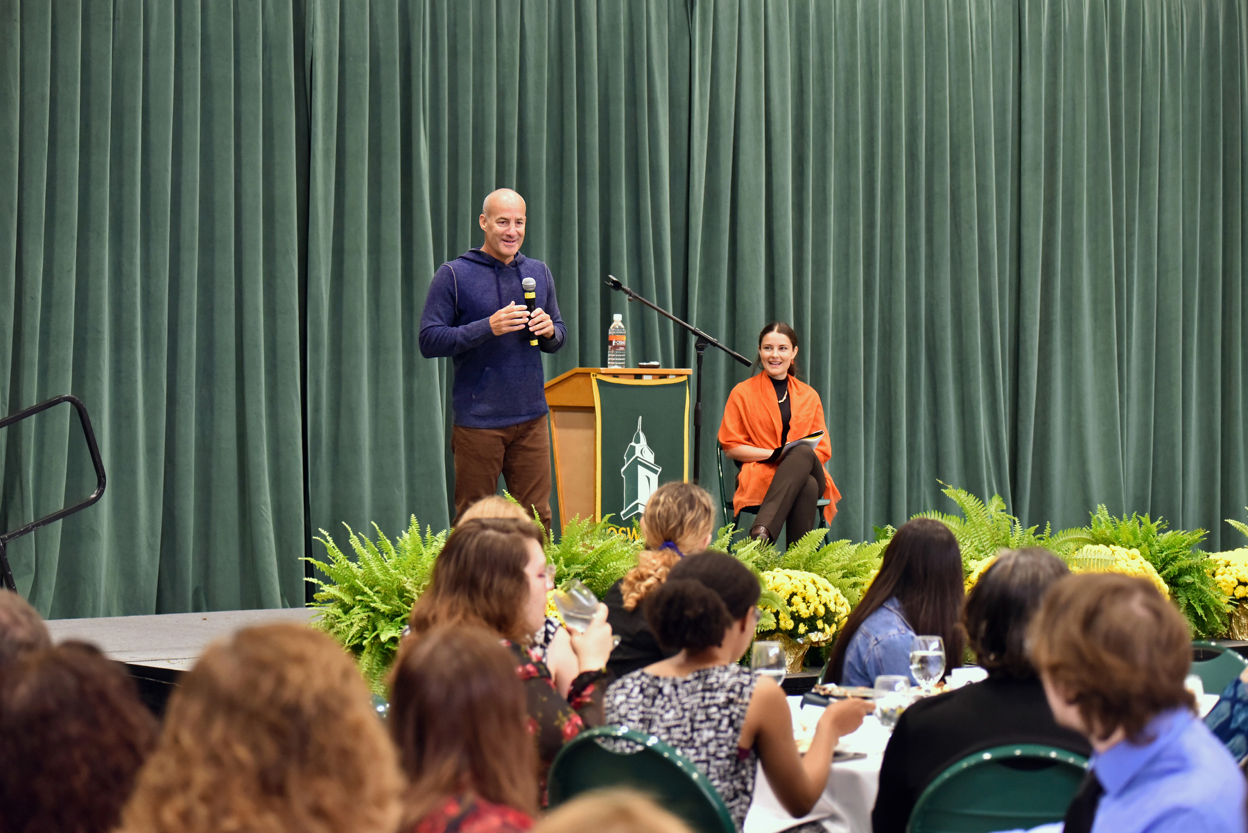 The 2023 Scholars Brunch brought together nearly 300 scholarship recipients, benefactors and university community members to share appreciation for each other and SUNY Oswego. Speakers at the Sept 30 annual event in Marano Campus Center – among them James Triandiflou, '88 along with Dianora De Marco '14 M'15 (pictured on stage) – highlighted the significant impact philanthropy makes on students, donors and the SUNY Oswego campus.