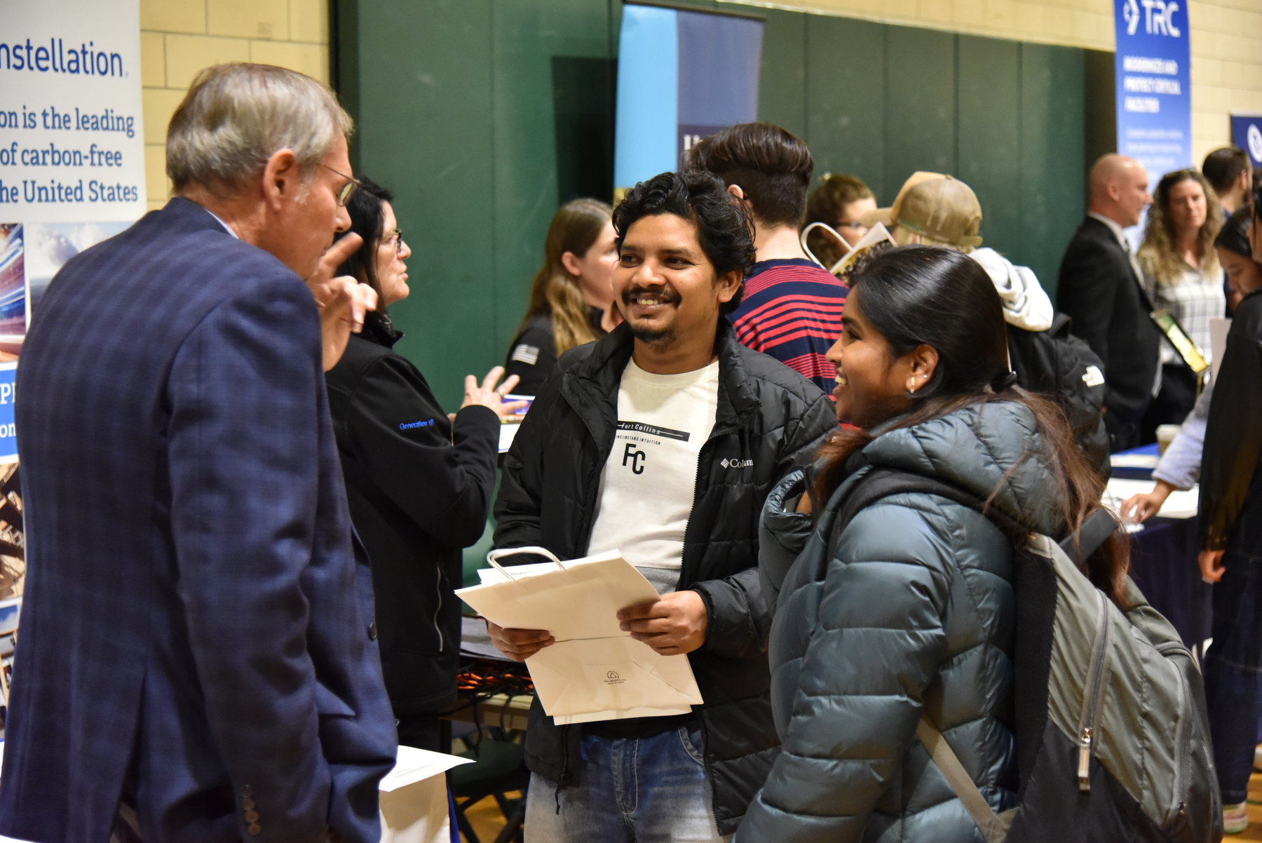 Oswego students took advantage of the opportunity to network with 100+ employers at the Fall 2023 Career and Internship Fair. The Oct. 18 event was hosted by Career Services and held in the Swetman Gym in the Marano Campus Center. Pictured, graduate students in the biomedical field Jasmitha Pilli and Babu Rajendraprasad Tadigiri talk with Dave Mankiewiez from Centerstate CEO/Corporation for Economic Opportunities.
