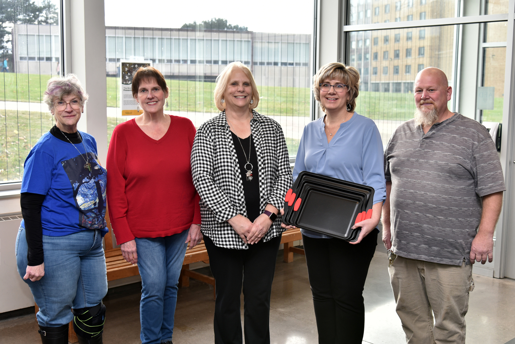 The State Employees Federated Appeal (SEFA) annually hosts Bake Off fundraisers to support the United Way of Greater Oswego County. The chefs who created the most popular desserts by public votes during this fall's event gather for a photo Nov. 27 while picking up prizes from SEFA. From left are: Judith Wyman Collette, Theatre; Susan Drobar, Mathematics; Christine Dallas, Graduate Studies; Kristin Gublo, Chemistry; and Royal Rogers, Environmental Health and Safety.